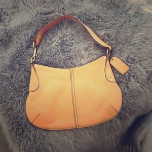 Leather Coach handbag.